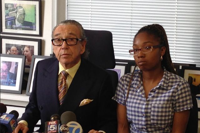 Attorney Sanford Rubenstein, and his client who's suing the MTA, Sheena Tucker.